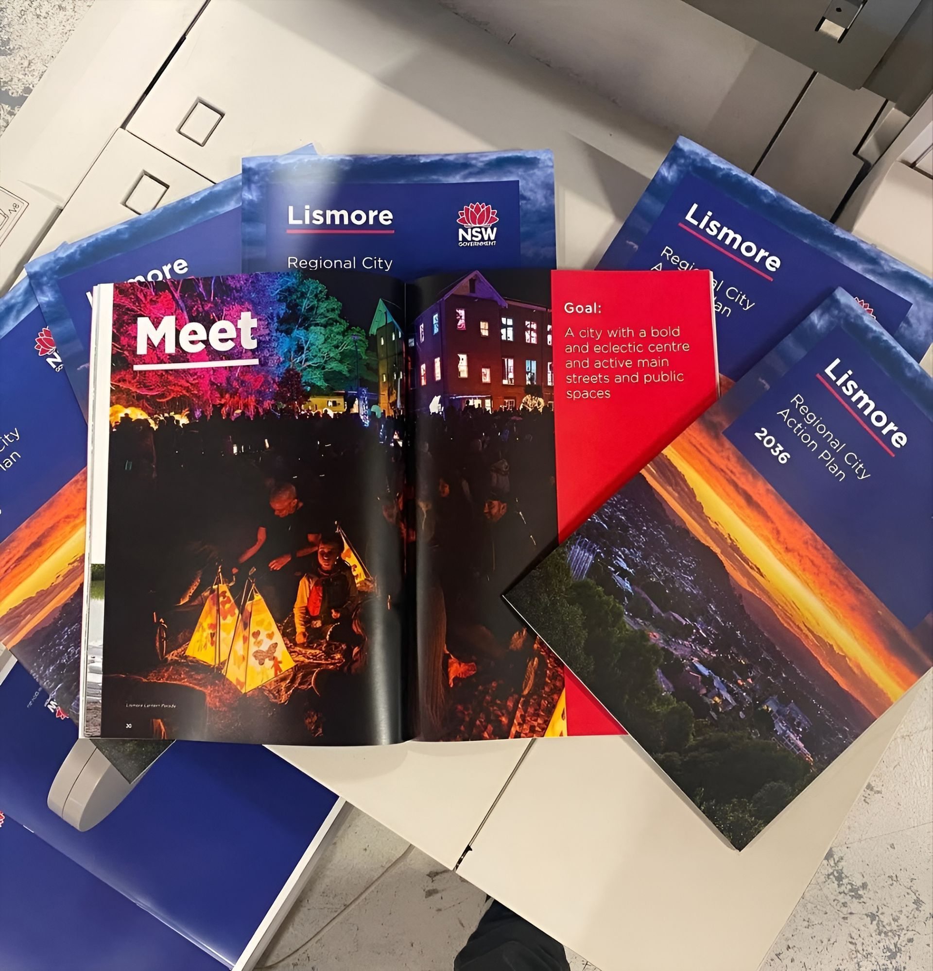 Brochures of Lismore, New South Wales, Spread on A Table — Digi Print Pro in Lismore, NSW