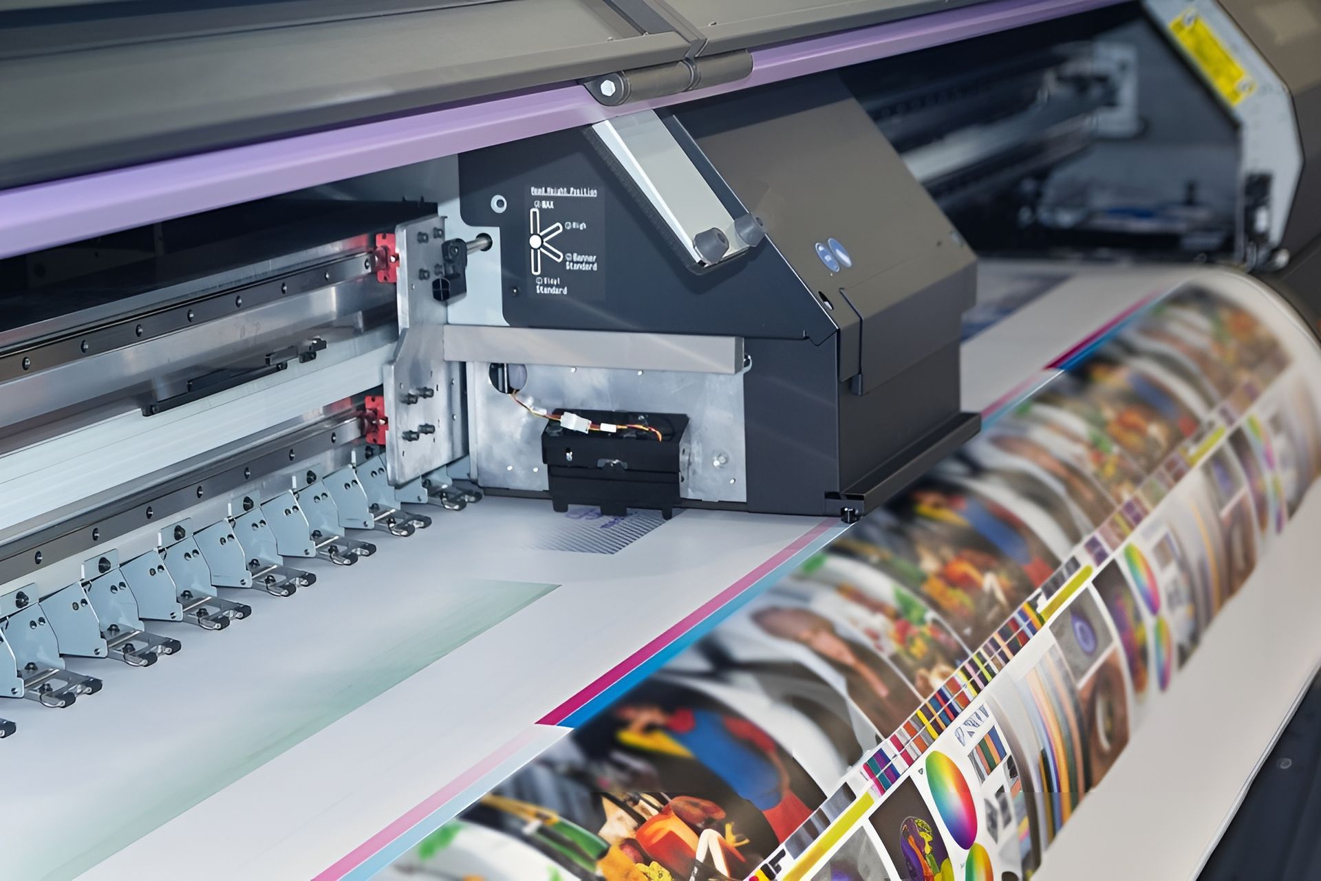 Large-Format Printer Printing a Colorful Roll of Paper, Close-Up View — Digi Print Pro in Mullumbimby, NSW