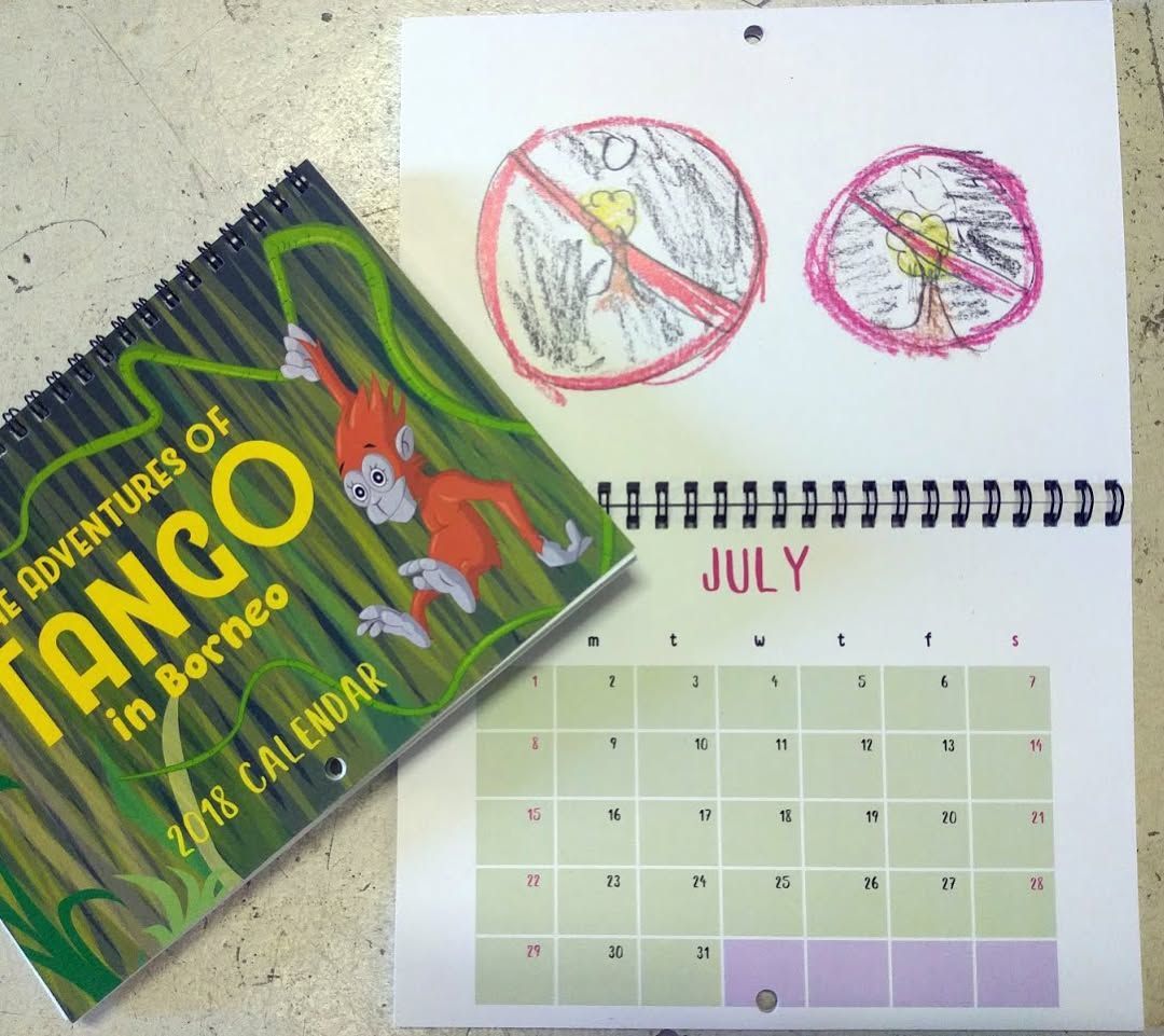 Calendar With July Page Open with Red Drawings of A Figure Crossed Out — Digi Print Pro in Casino, NSW