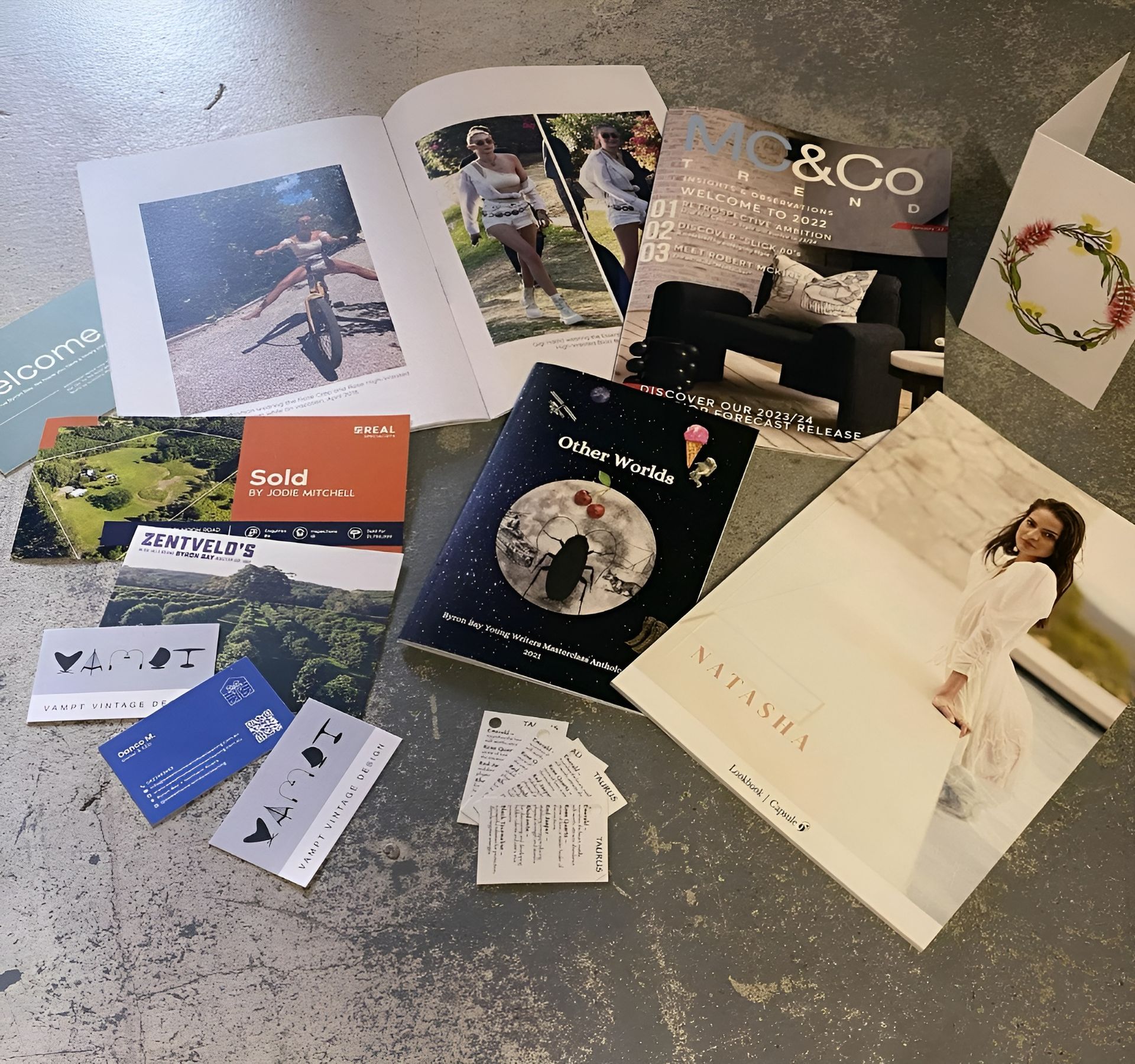 Assortment of Printed Materials — Brochures, Cards, and Catalogs on A Gray Surface — Digi Print Pro in Bangalow, NSW