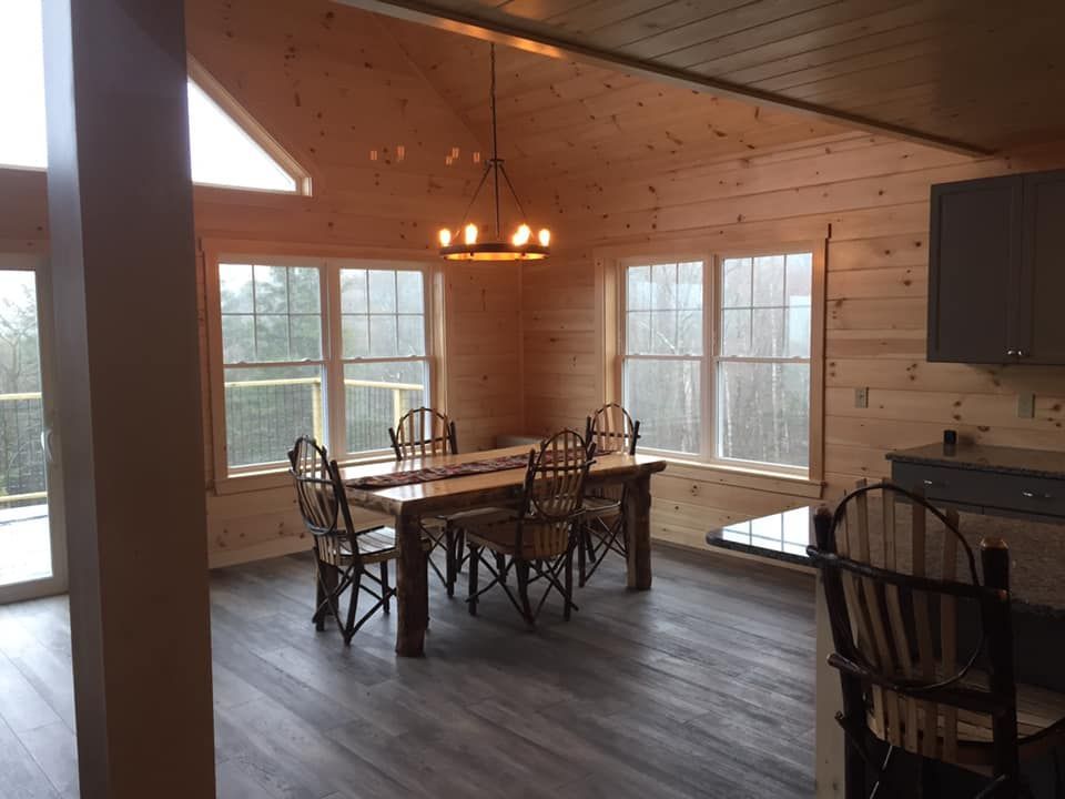 Dining Room With Table And Hanging Light
