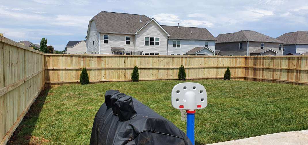 There is a basketball hoop in the backyard of a house. Clarksville, TN