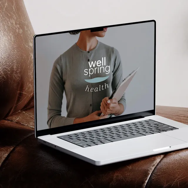 Wellspring Health Wellness logo & brand design on laptop view, health marketing project