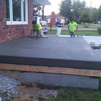 Porch Concrete Construction — Two Man in Neon Green Constructing Flooring in Louisville, KY