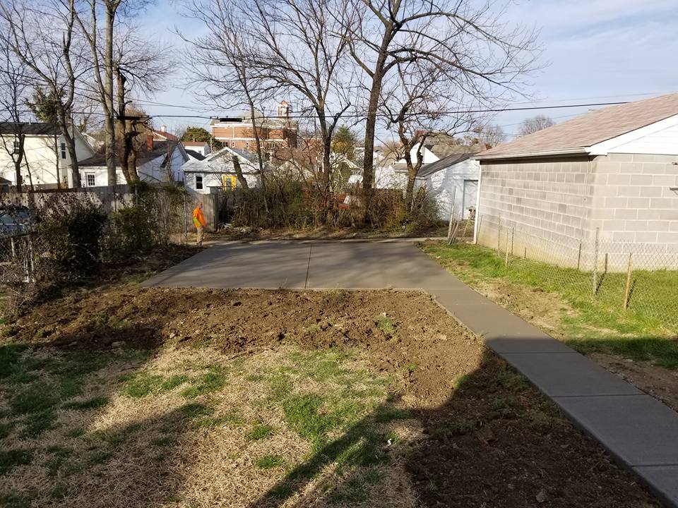 Pathway Area Concrete — Man Staring at the Concrete Flooring in Louisville, KY