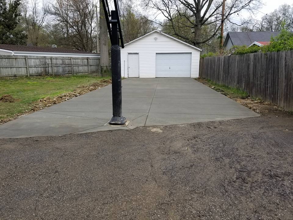 Storehouse Concrete Construction — Concrete Flooring with Metal Post in the Center in Louisville, KY