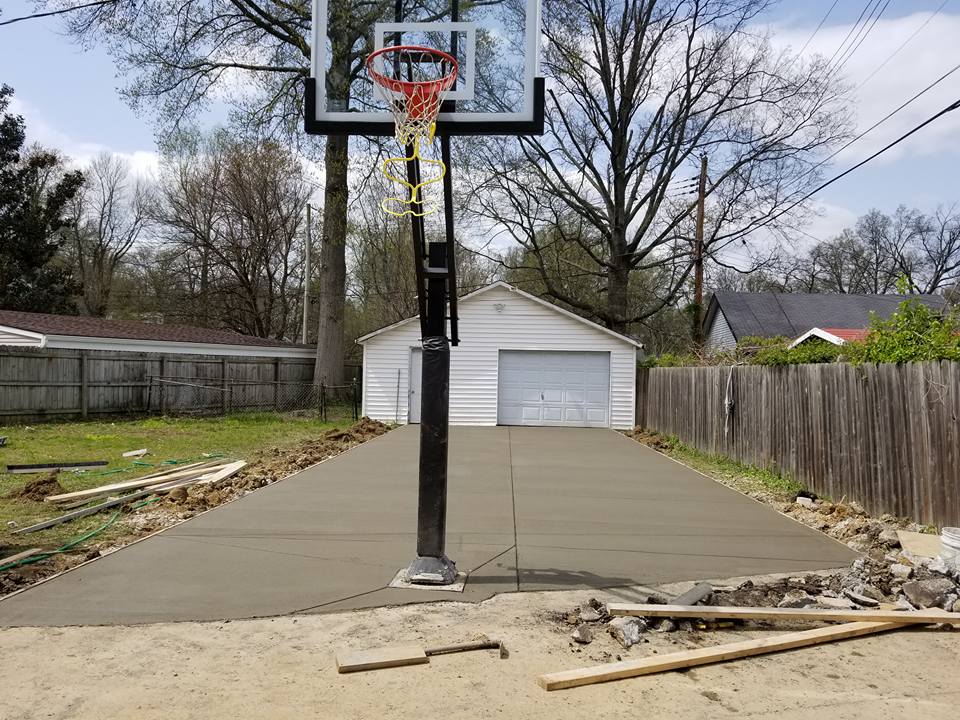 Garage Pathway Cement Flooring — Concrete Flooring with Basketball Post in Louisville, KY