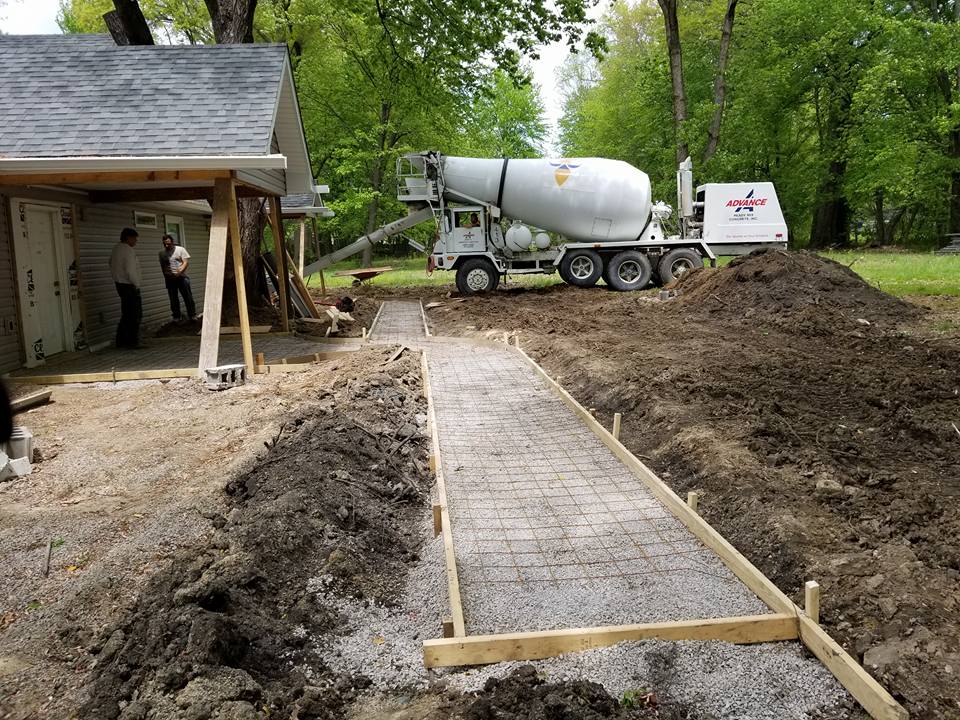 Pathway Construction Process — Cement Truck Transferring Cement in Louisville, KY