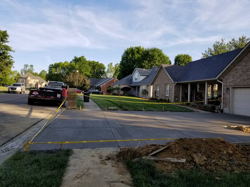 Garage Renovation — Garage Pathway with Yellow Tape for Caution 3 in Louisville, KY