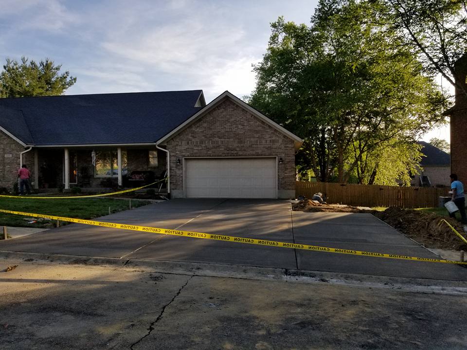 Garage Pathway Reconstruction — Garage Pathway with Yellow Tape for Caution 1 in Louisville, KY