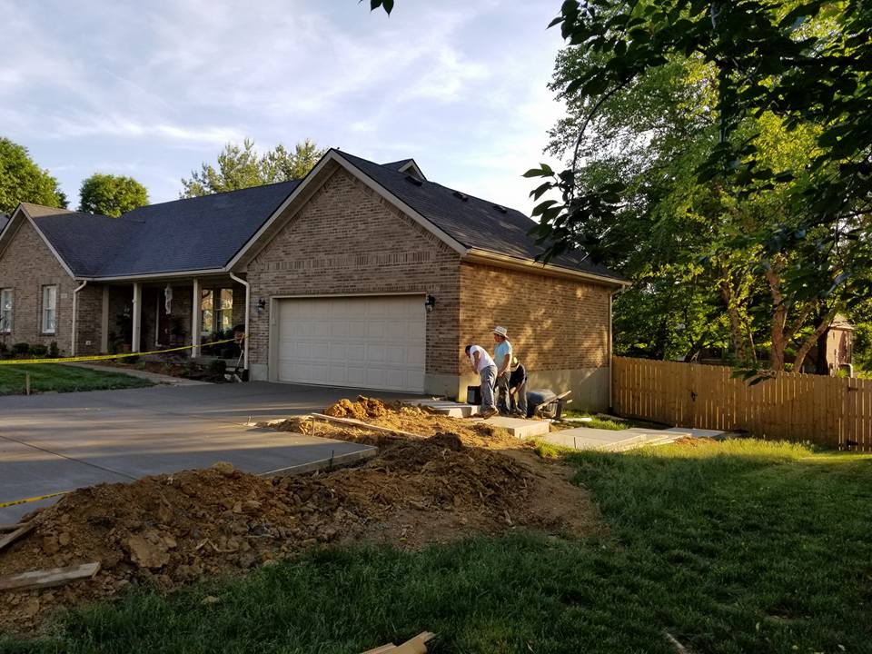 Garage Sidewalk — Three Man Constructing Pathway in Louisville, KY