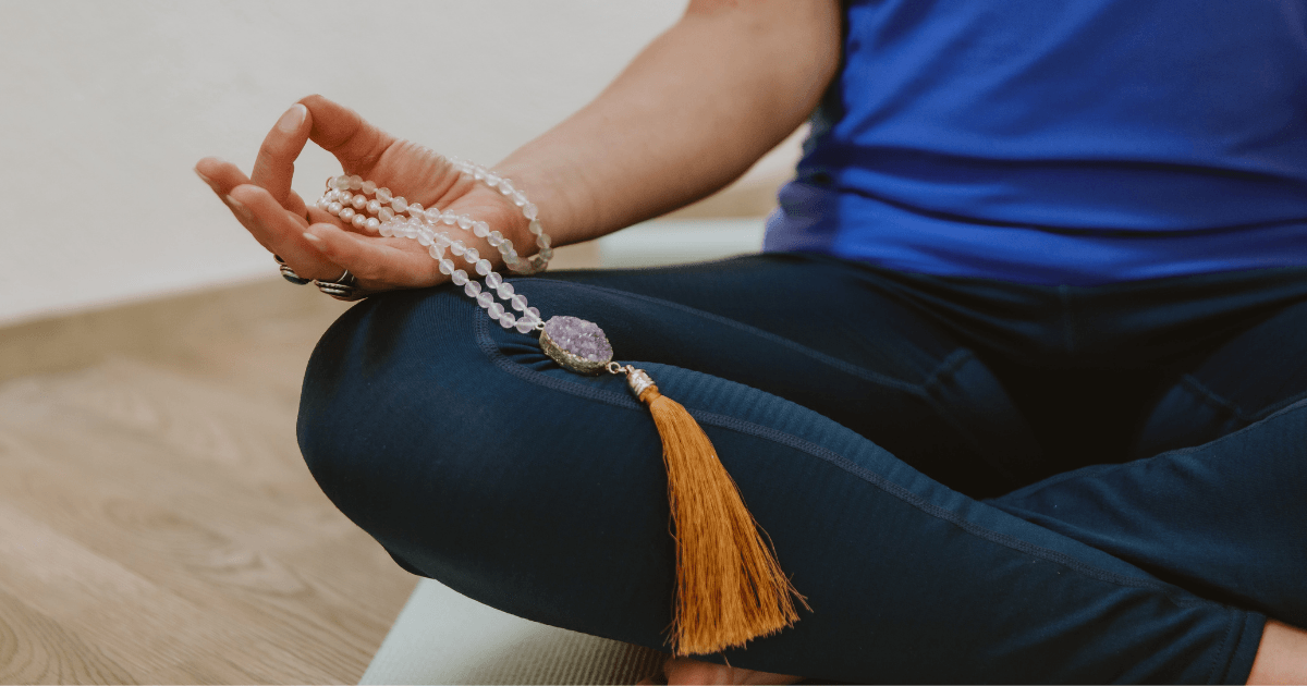 Summer DeBue in seated yoga posture