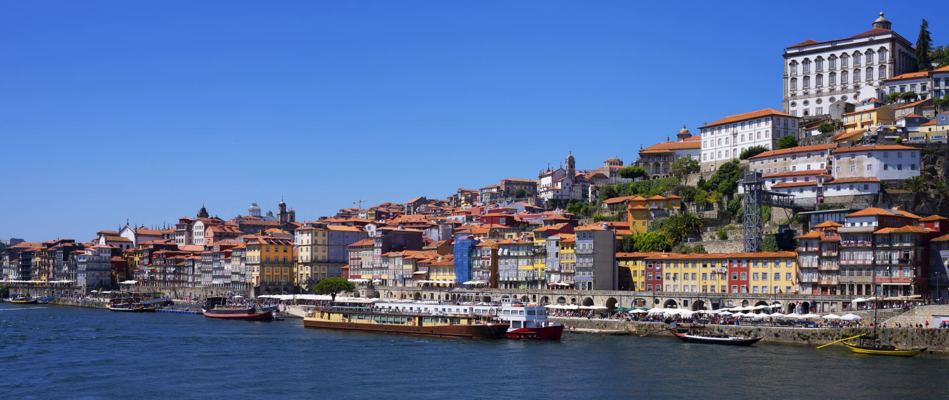A large body of water with a city in the background