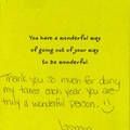 A yellow card with a thank you message on it.