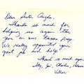 A close up of a handwritten letter on a white background.