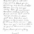 A close up of a handwritten letter on a white background.