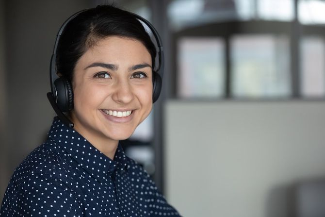 Woman with headset as customer service rep for Lift and Shift