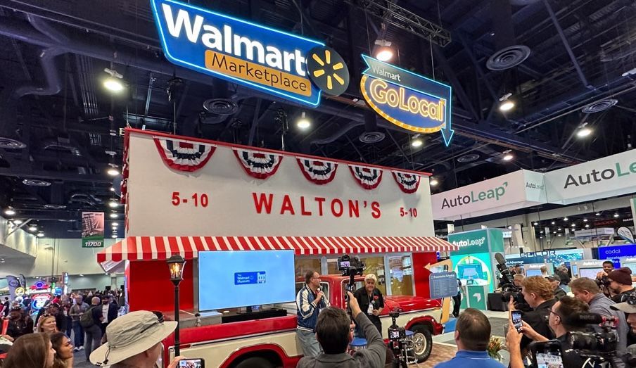 a walmart marketplace sign hangs above a food truck
