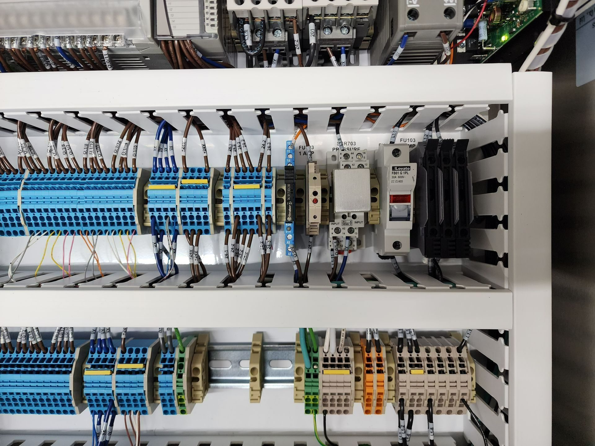 A bunch of wires are connected to a electrical box