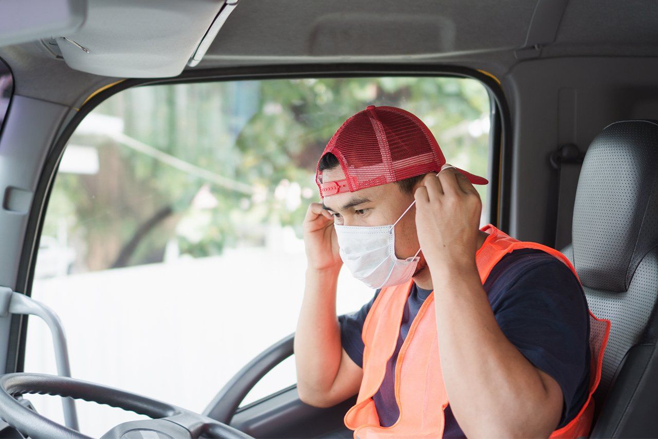 Truck Driver Wearing A Mask — King George, VA — Duffield Hauling Inc.