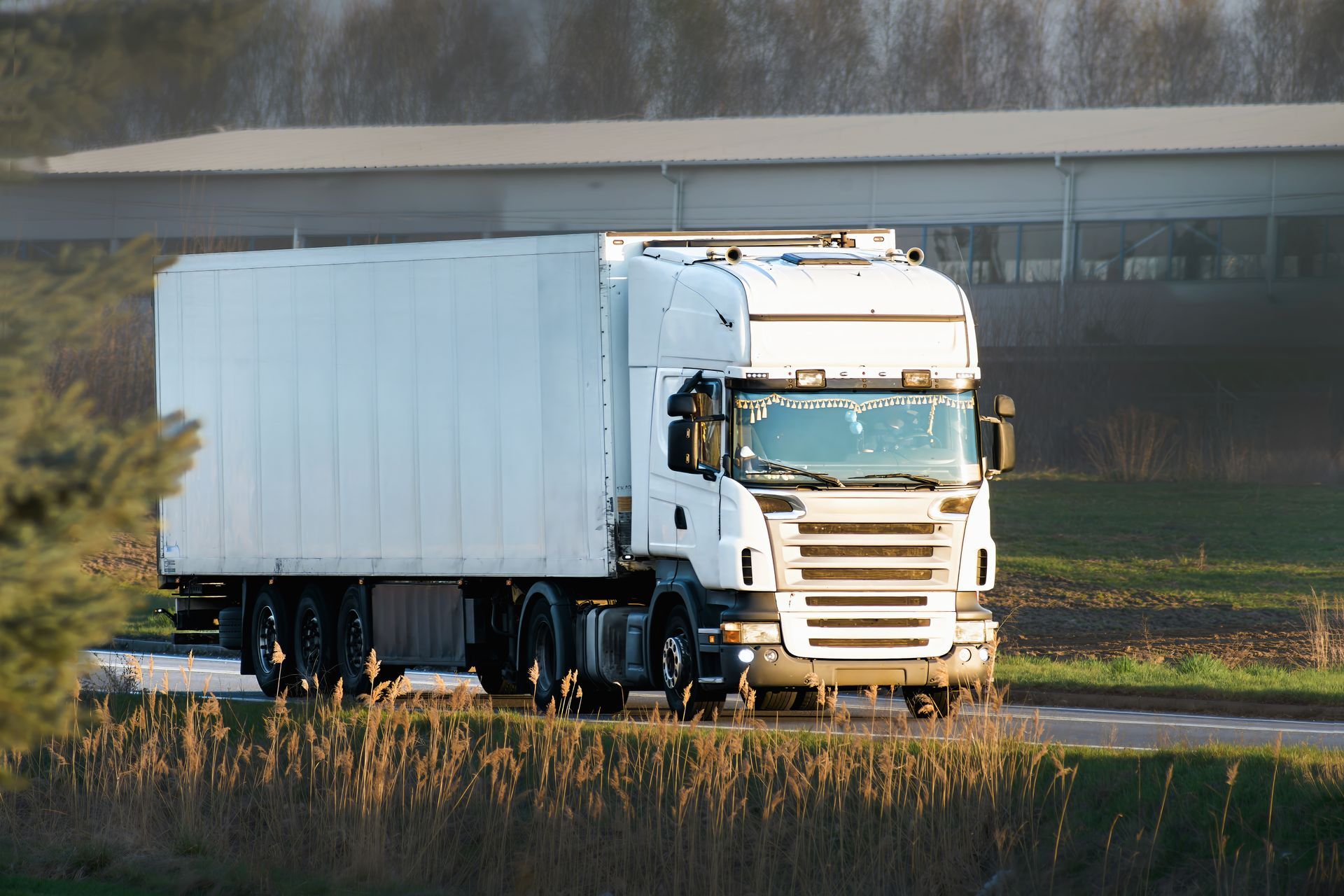 Semi truck transporting cargo on open road