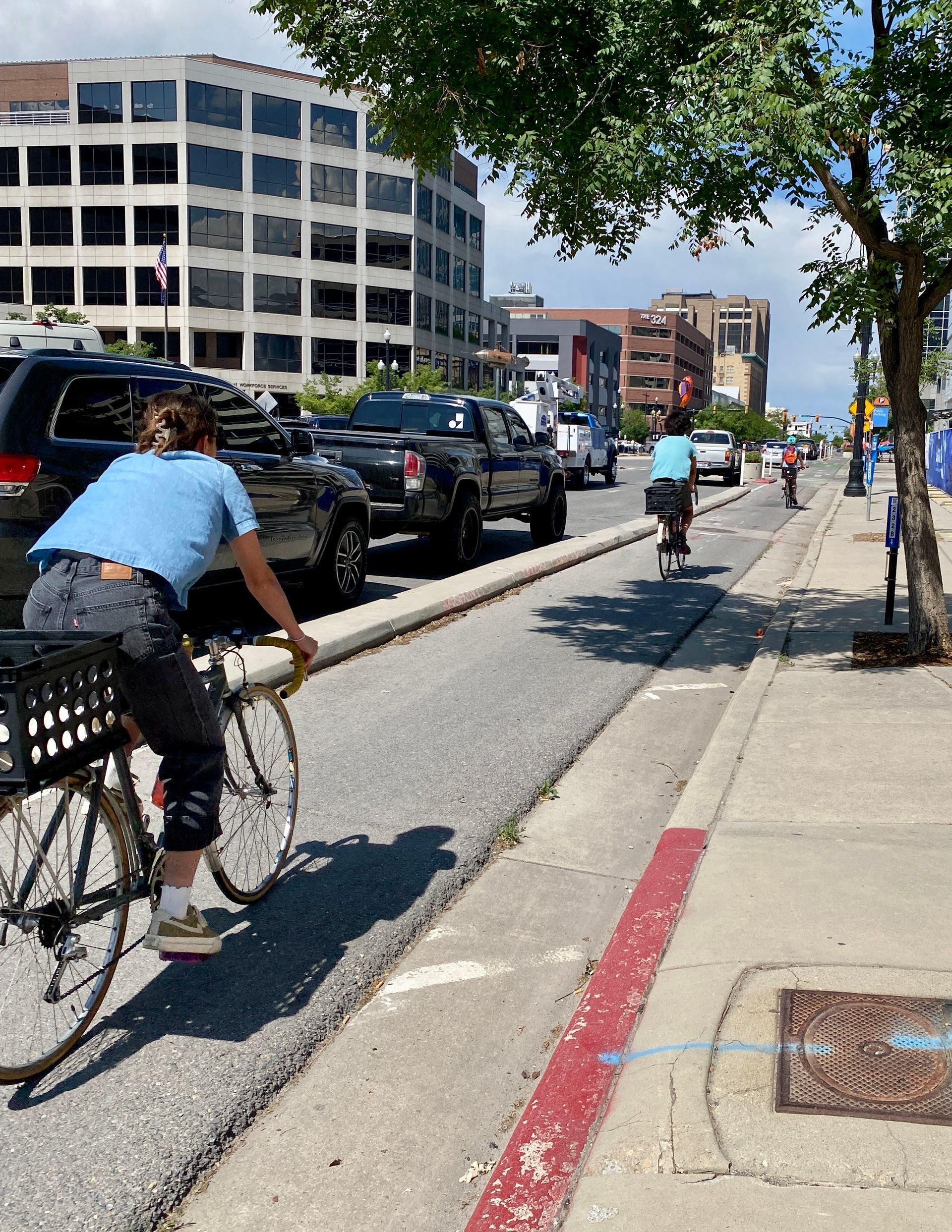 cyclists on SLC protected bike lane