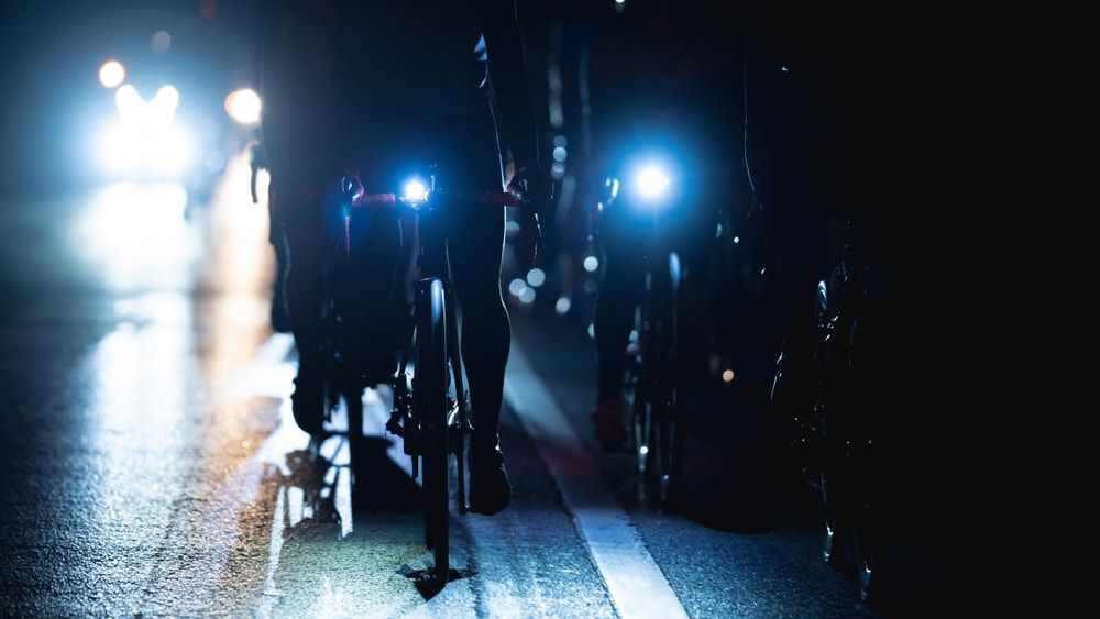 bicycles at night with front white bicycle headlights