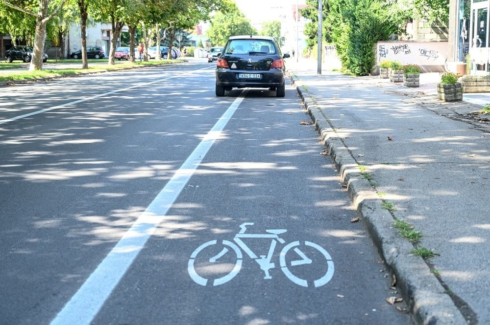 car parked in bicycle lane