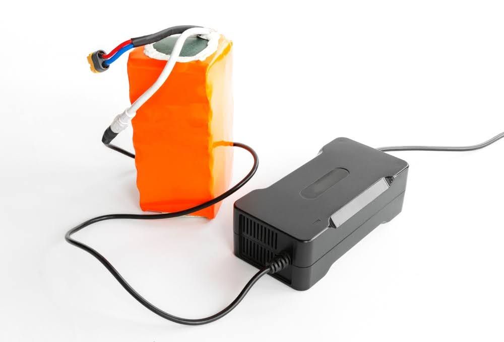 Charger connected to the Li-ion battery of an electric bicycle, the AC adapter charges the Li-ion battery pack.