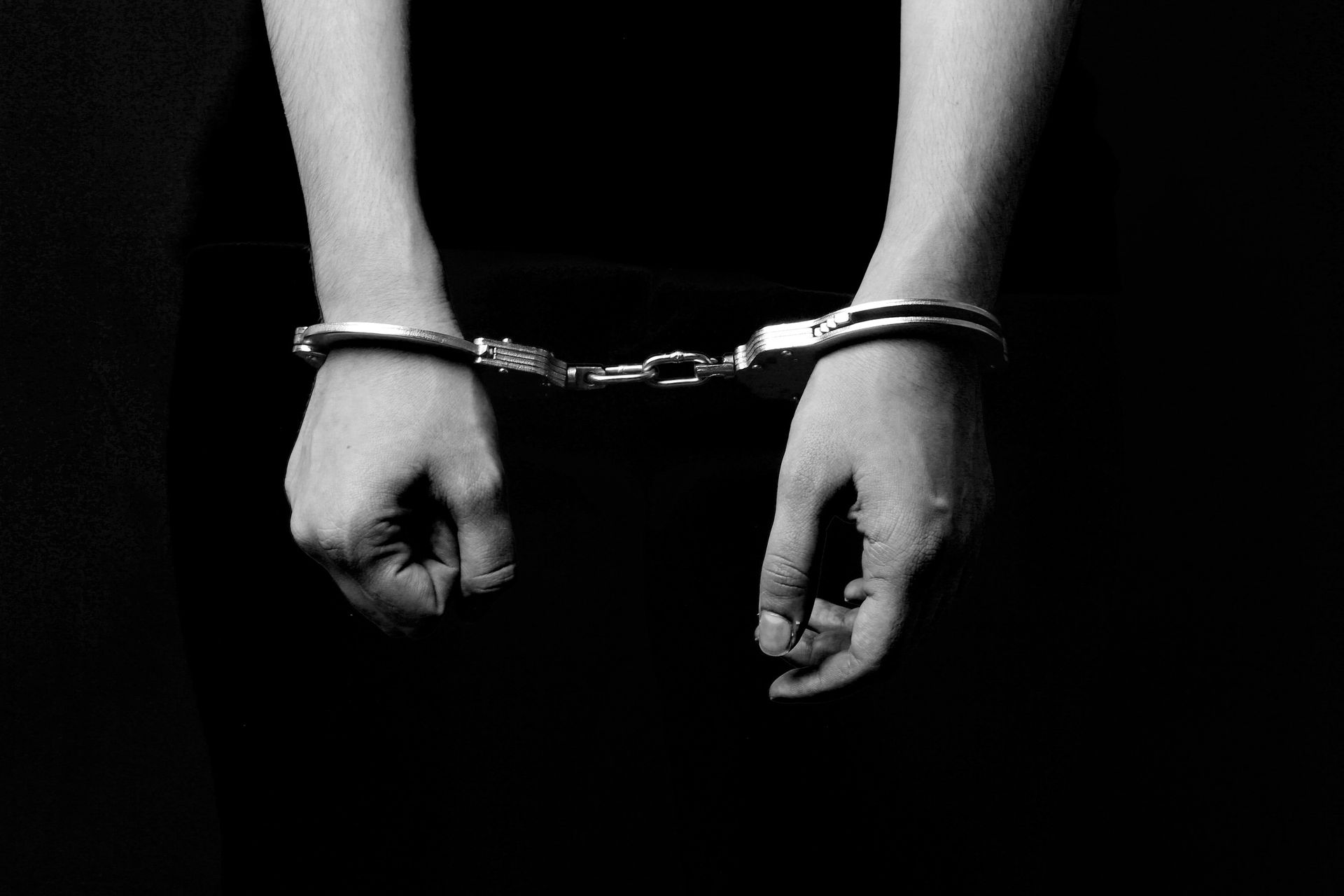 handcuffed juvenile male