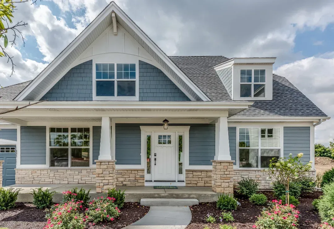 A large blue and gray house