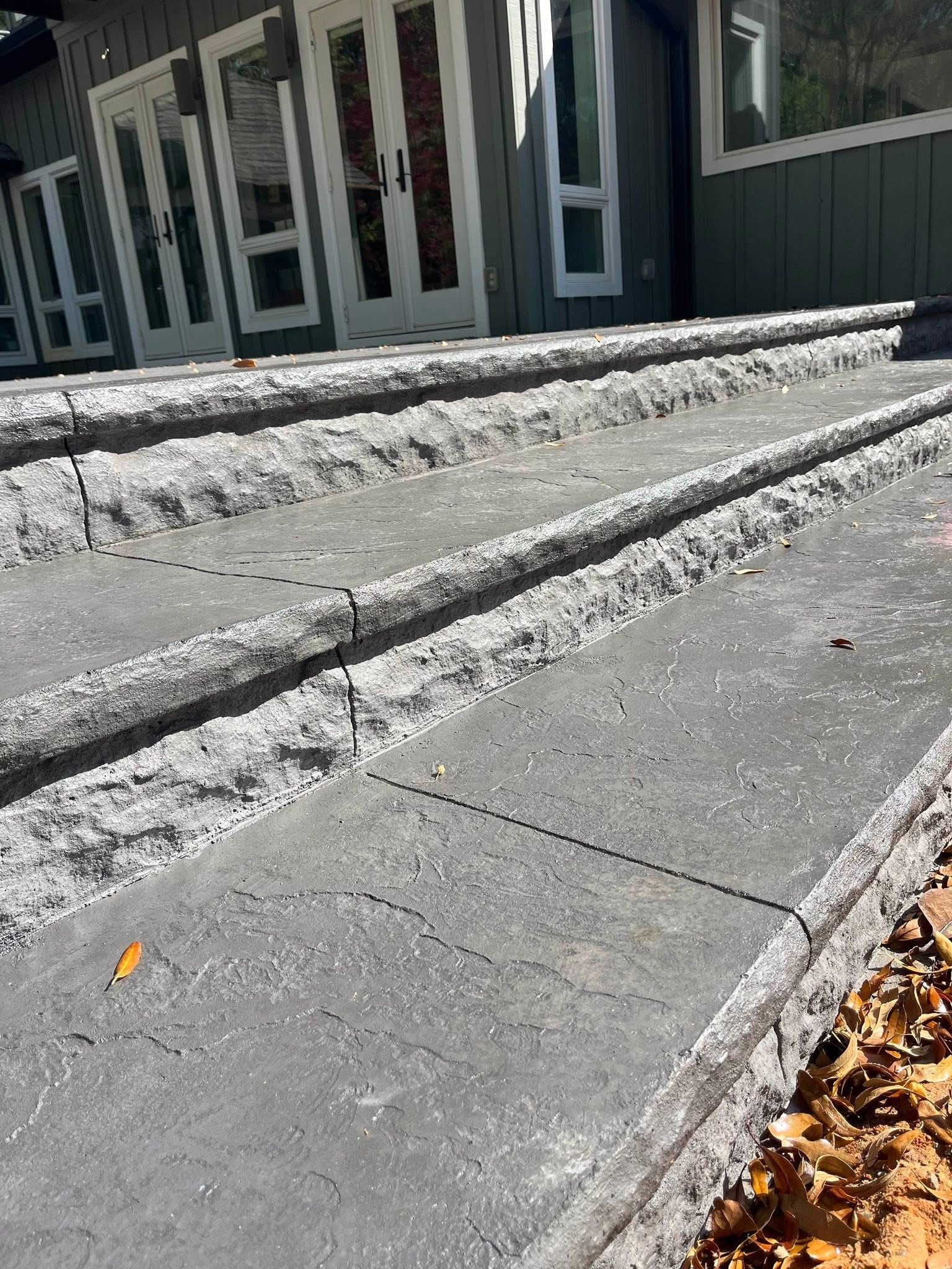 Curved pedestrian sidewalk in a nice neighborhood in the suburbs.