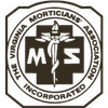 Emblem of The Virginia Morticians Association: white cross, serpent-entwined staff, and letters 
