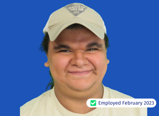 A man wearing a hat has been employed since february 2023