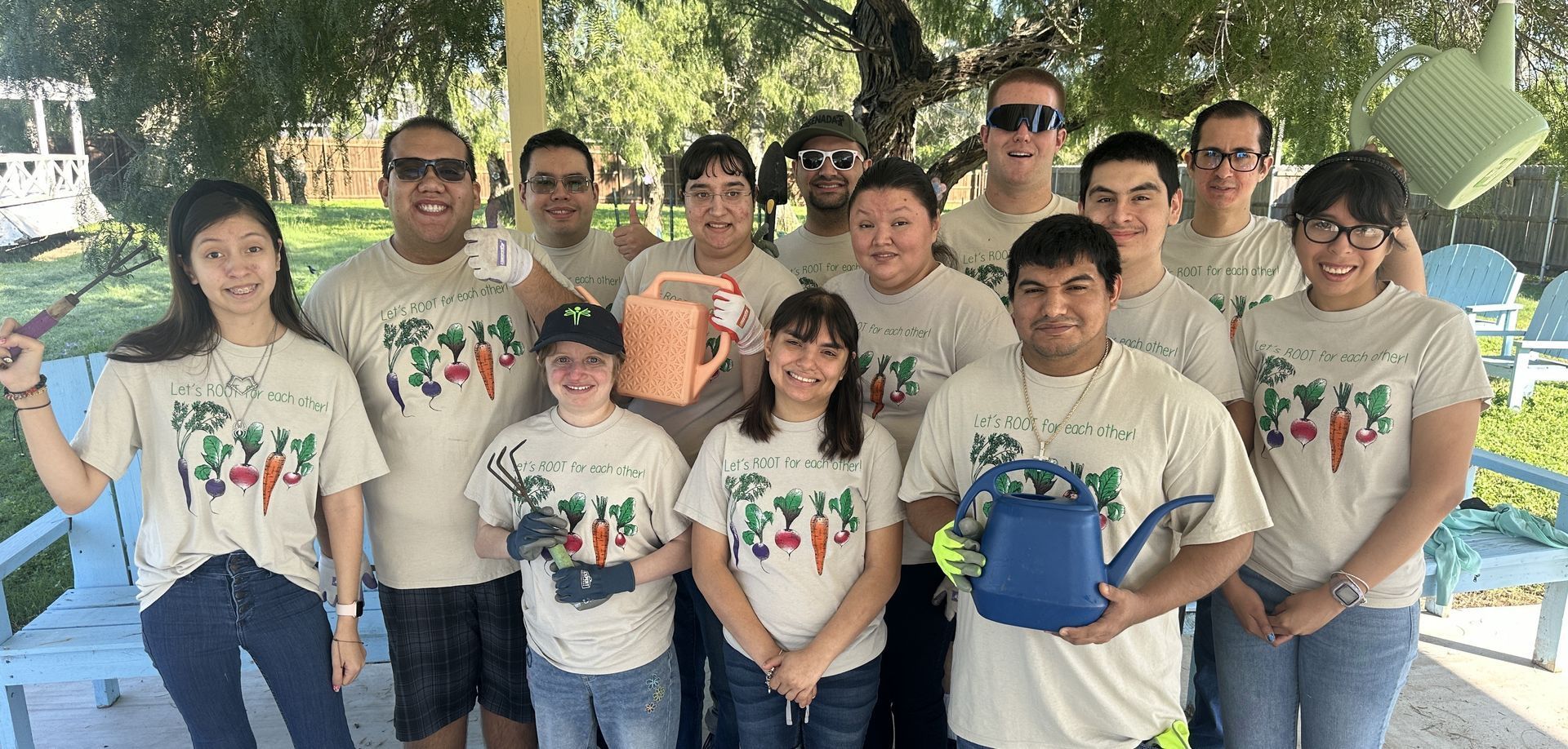A group of people are working in a garden.