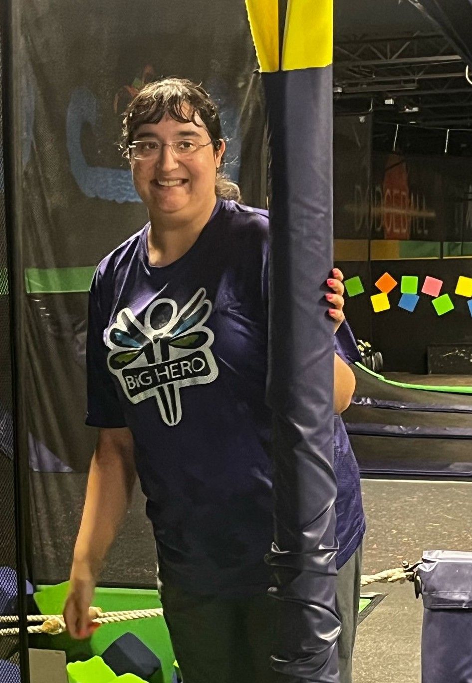 A woman wearing a shirt that says big hero