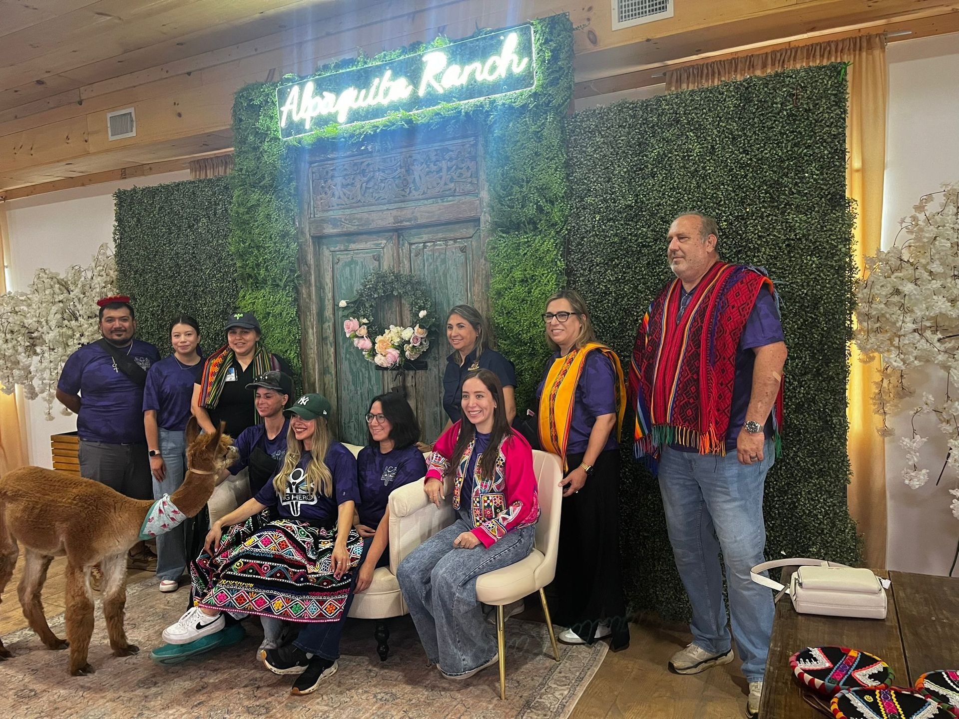 Group poses in front of a