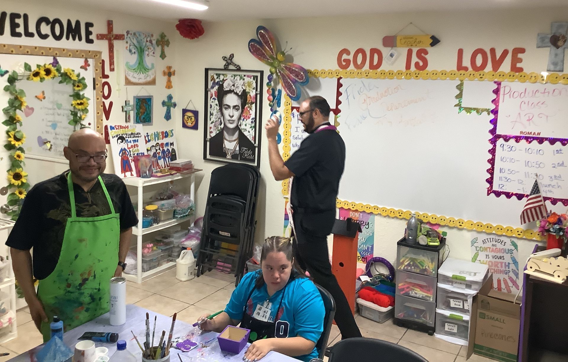 A classroom with a sign that says god is love