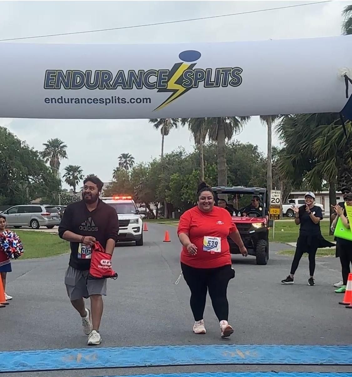 People walking under a banner that says endurance splits