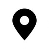 A black map pin with a circle in the middle on a white background.