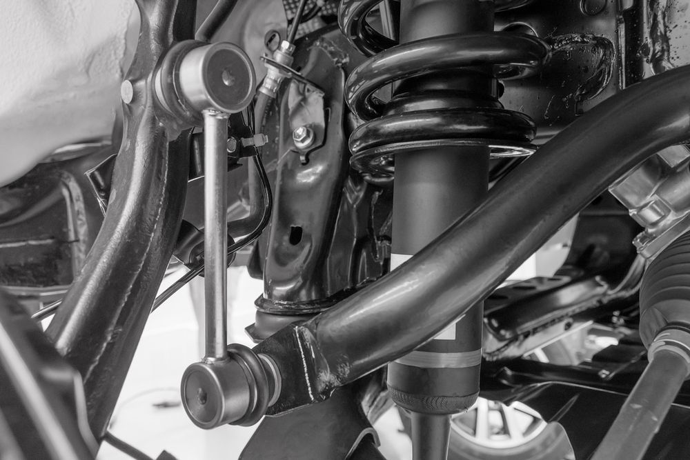 A Black and White Photo of a Car Suspension System — McCrackin Diesel in South Grafton, NSW