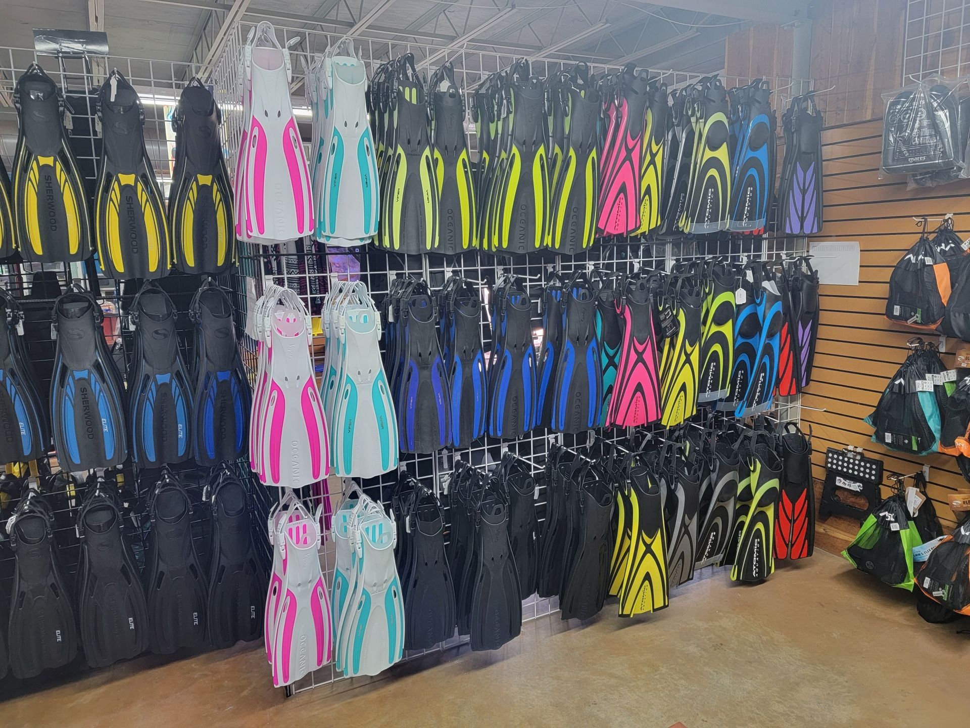 A store filled with lots of clothes and flippers.