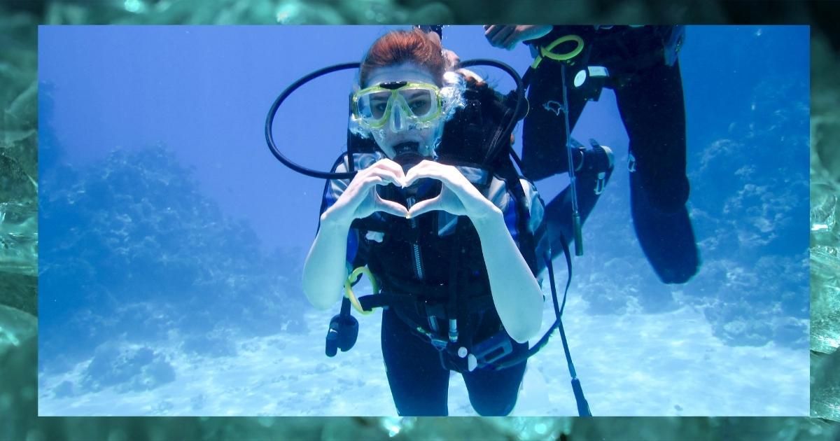 Diver enjoying the water and showing some love