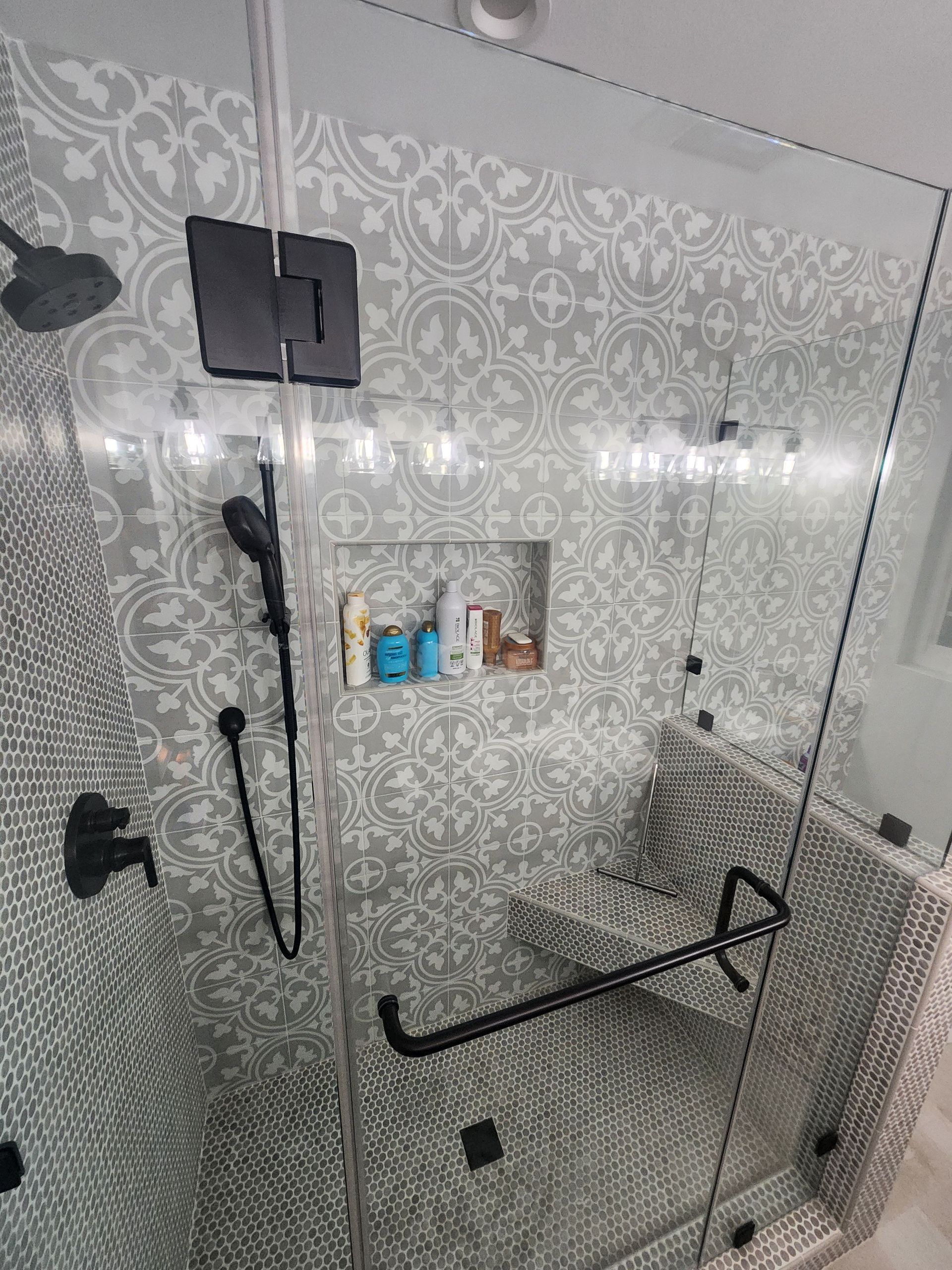 A bathroom with a walk in shower and a sink in Vermillion County, IL