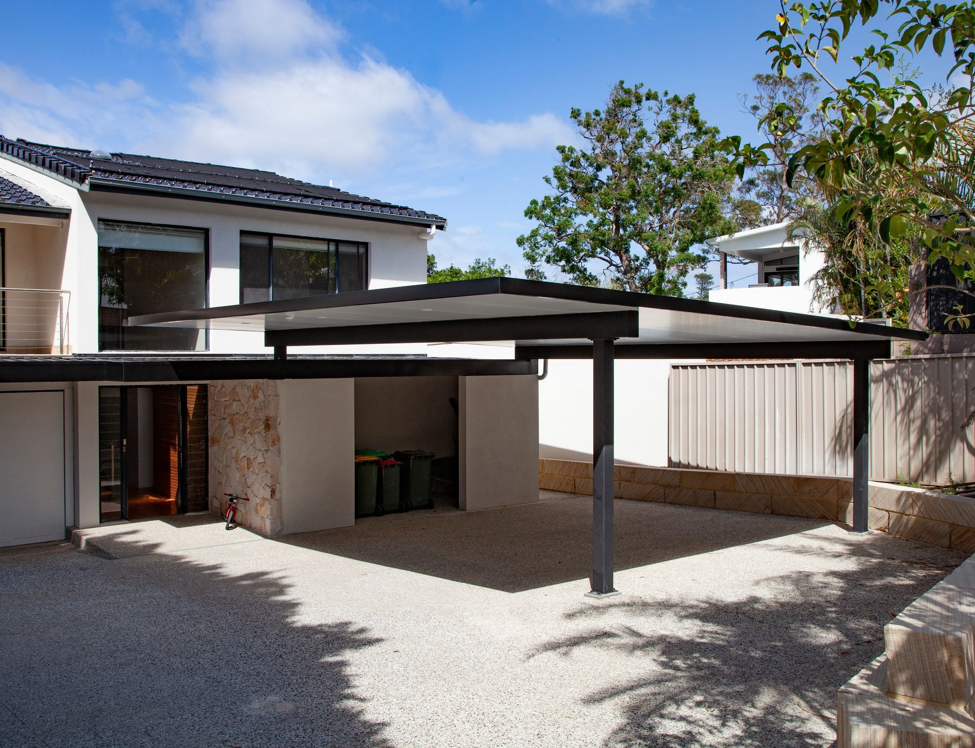 The brief was to have a family-friendly backyard that encourages sport and play whilst using high-end materials and finishes to elevate the value of the property.