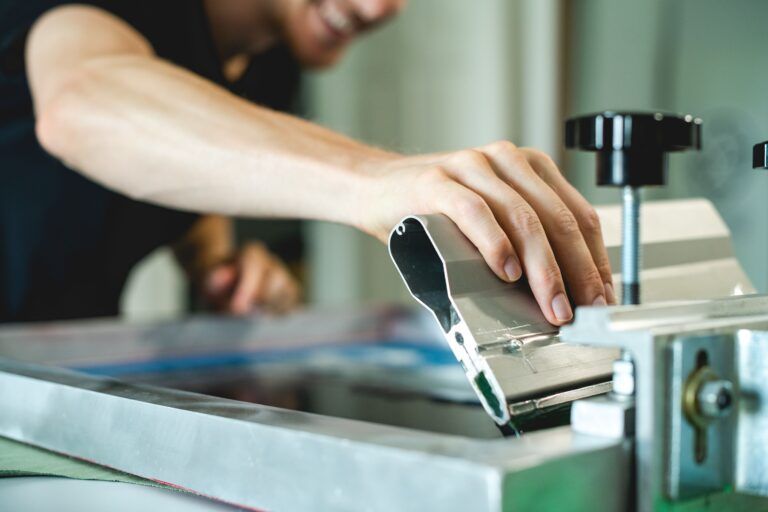 screen printer holding squeege