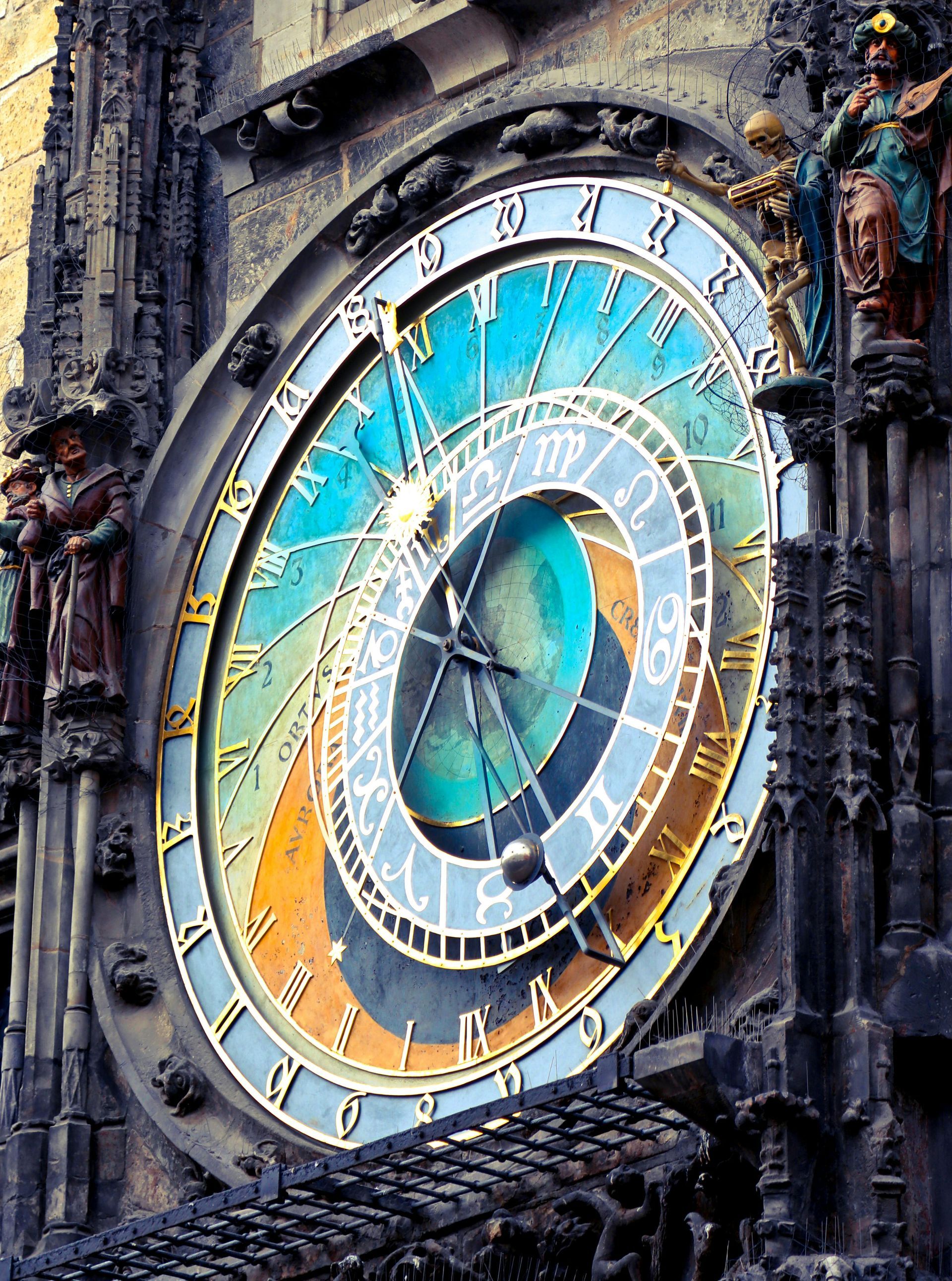 image of an antique large clock on the side of an old building