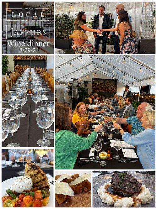 Wine dinner at Local Affairs. Guests clink glasses, dine, and enjoy food.