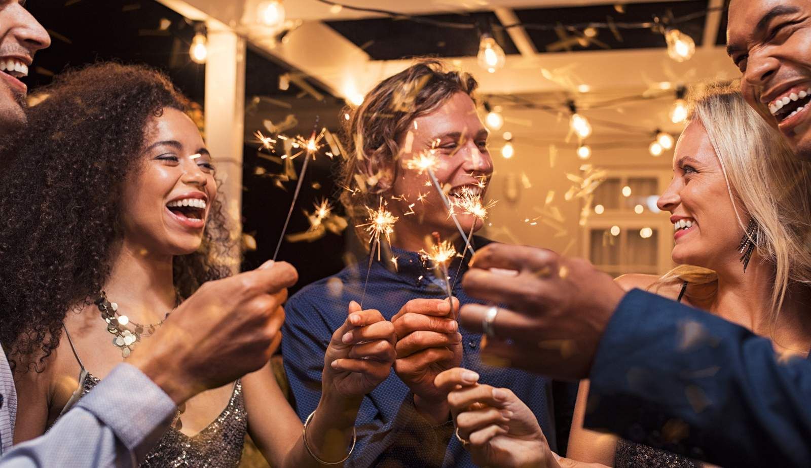 A family in Louisiana watching fireworks from a safe distance, enjoying the spectacle with joy and safety on New Year’s Eve.