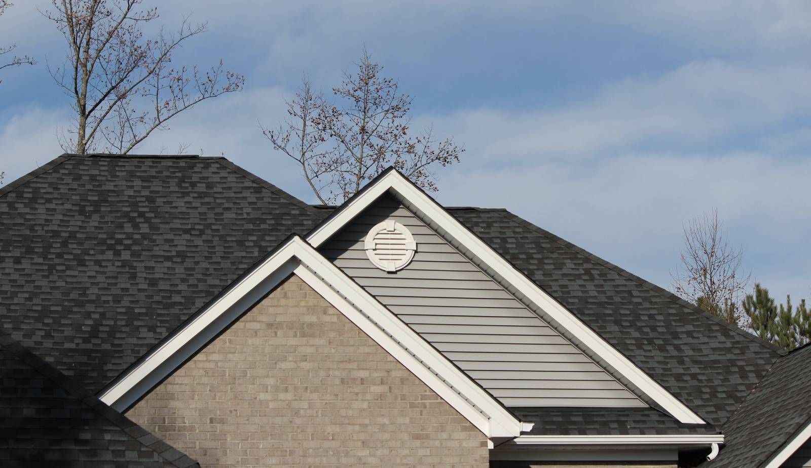 Roof maintenance tools and safety gear laid out before a repair, representing proactive steps